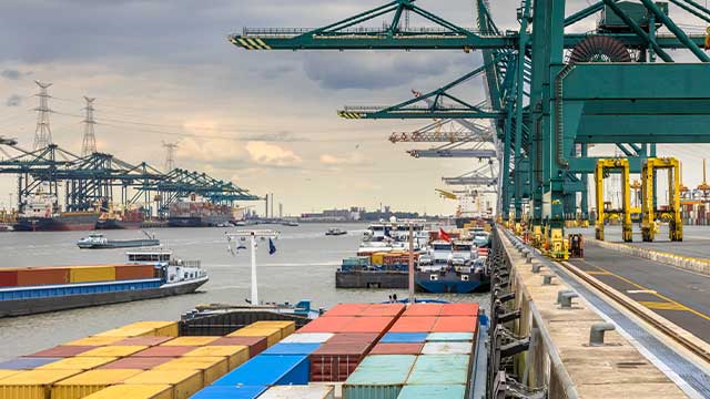 Container ship with colorful containers at Antwerp port